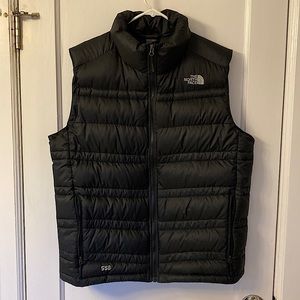 The North Face 550 down vest. Black. No stains, snags, rips or tears. Size LARGE